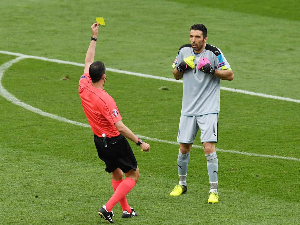 TOULOUSE, FRANCE - JUNE 17: Gianluigi Buffon of Italy is shown a yellow card from referee Victor Kassai for time wasting during the UEFA EURO 2016 Group E match between Italy and Sweden at Stadium Municipal on June 17, 2016 in Toulouse, France. (Photo by Dennis Grombkowski/Getty Images)